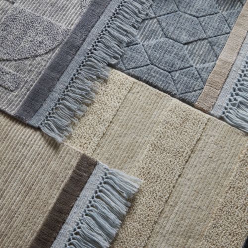 The Art of Layering Rugs: Adding Depth and Dimension to Your Interiors